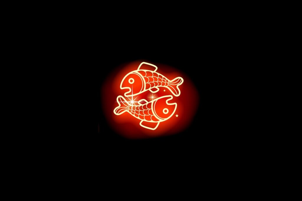 Ilustração em vermelho neon do signo de Peixes em fundo preto
