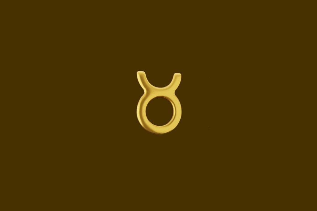 Ilustração do símbolo do signo de Touro dourado em um fundo marrom