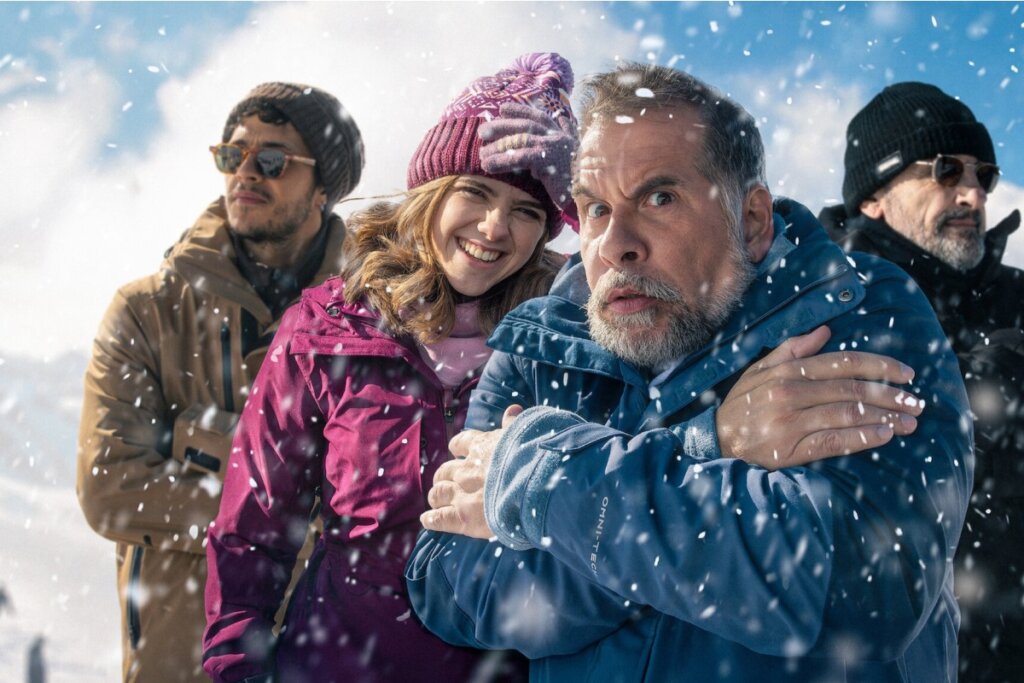 Ilustração de uma família na neve, com quatro pessoas vestindo roupas de frio