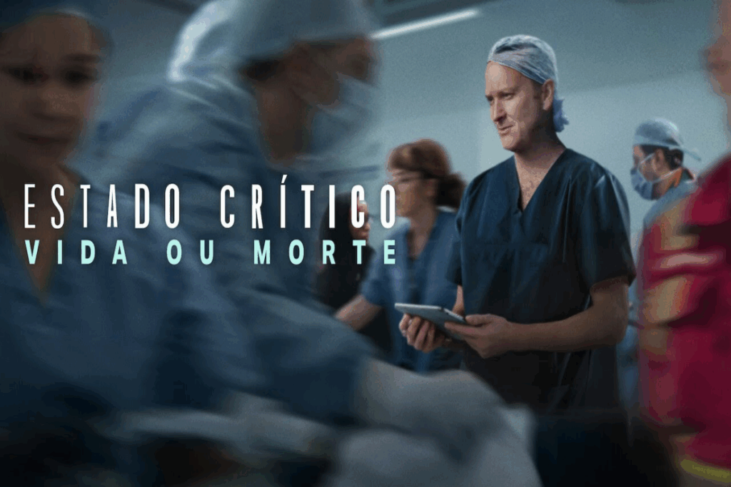 Imagem de um homem com roupas de médico em corredor de hospital, com pessoas correndo ao redor e escrito o nome da série